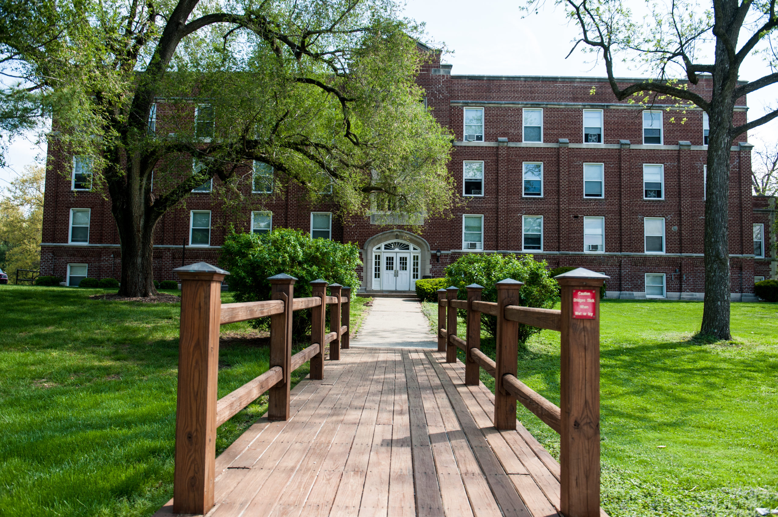 Wide shot of Stoddard Hall and the bridge that connects it with Hudson Hall.