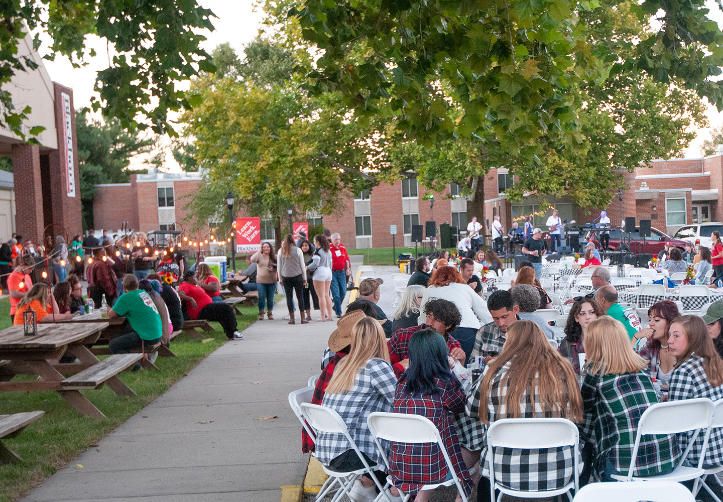 Wide shot of the crowd in front of the Demuzio Campus Center during the 2022 Homecoming festivities.