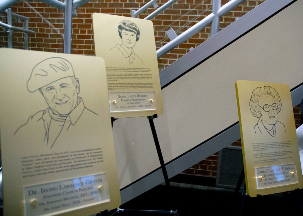 Three plaques with artistic renderings for the individuals honored with named professorships:  James C. & Enid J. Pegram (Fine Arts), Dr. Irving Lawrence Graves (Biology), and Sonja Faust Hudren '66 (Education).