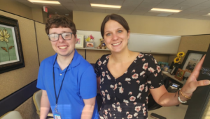 Blackburn student Daniel Olsen and Alicia Rentmeister, Daniel's IDHS VR Counselor, smile for the camera during his summer internship. (courtesy of IDHS' Stakeholder Newsletter)