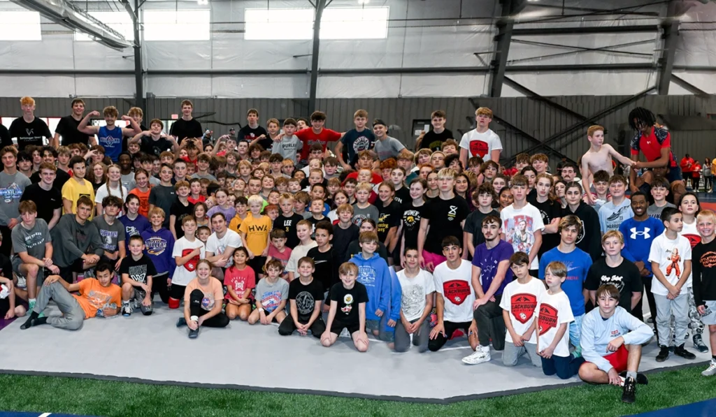 Children gathered in new Blackburn Athletic Center for wrestling clinic