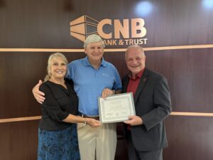 Pictured from left to right are Janie Ashworth, Jim Ashworth, and President Larry K. Lee.