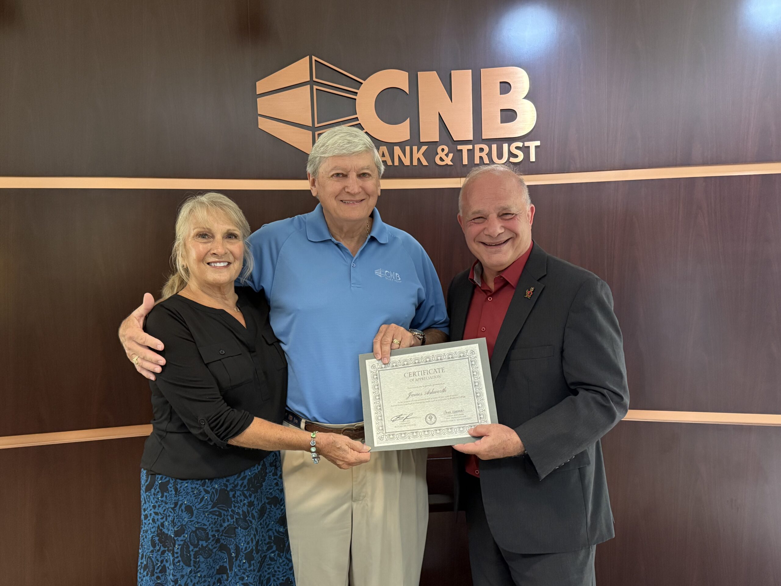 Pictured from left to right are Janie Ashworth, Jim Ashworth, and President Larry K. Lee.