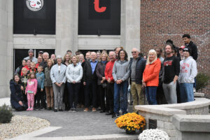 Students, administrators, and Boente family members gather for the dedication of the plaza