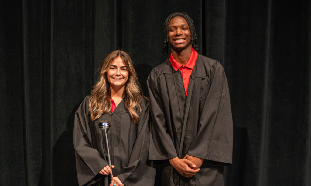 Rylee Lovelace and former Student Marshal  Darius Duff pose together