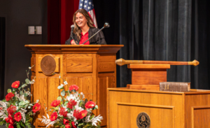 Rylee Lovelace speaks at All College Convocation